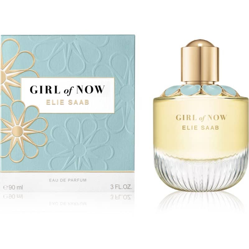 elie saab girl of now eau de parfum flakon 90ml neben hellblauer, mit blumen verzierter originalverpackung